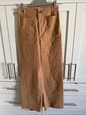 Maeve Colette in Tan